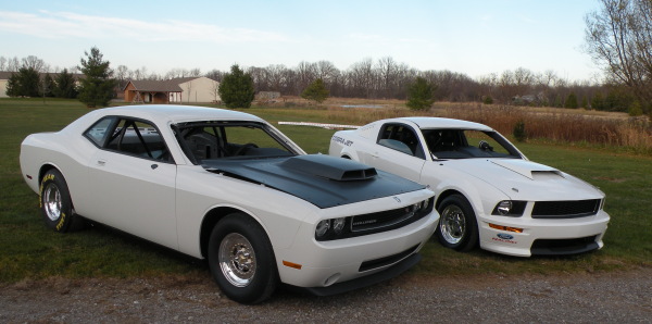 A pic Mike P took at his shop of our #24 Drag Pak, next to.....you guessed it #24 SCJ....notice the Challenger is slightly  in front :)