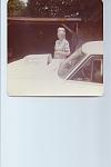 Granny in 1975 standing between "Granny's garage" and the 62 Chevy II  1972 - 1975