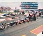 Indy 2001 Garlits and Greek  
Garlits first 300 mph pass. 
My dad and I are behind Greeks car. 
One of only a very few photos of Dad and me on the...