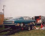 Ken Bowers swearing like a sailor underneath his Super Street Cuda. I think he was having trans issues. Numidia Aug. 95'