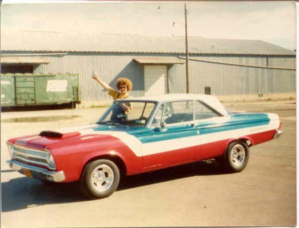 65 Plymouth Satellite  This was an old Plymouth I found. Originally a 273 engine w/automatic trans. I rebuilt it with a 413 w/ 2 fours, and a Clutchflite transmission. Yup, it ran fine. BTW, picture is circa 1972, accounting for my friend's hairstyle.